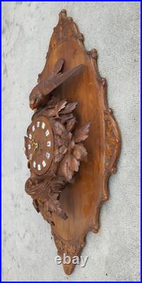Ancienne horloge murale foret noire BRIENZ bois sculpté black forest nest bird