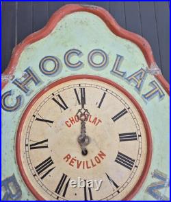 Ancienne horloge pendule publicitaire Chocolat Révillon en tôle lithographiée