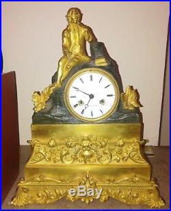 Ancienne pendule bronze dore restauration romantique JJ Rousseau horloge Empire