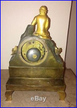 Ancienne pendule bronze dore restauration romantique JJ Rousseau horloge Empire