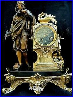 Ancienne pendule horloge au décor de René Descartes Régule doré XIX°