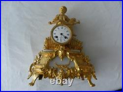 Ancienne pendule horloge en régule doré MOUREY & COUENNE