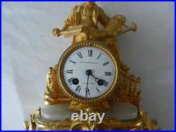 Ancienne pendule horloge en régule doré MOUREY & COUENNE