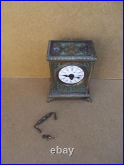 Ancienne pendule réveil d officier en bronze décors lithographier de chiméres