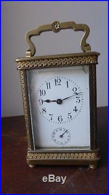 Ancienne pendulette pendule de voyage d'officier en bronze ciselé. Officer clock