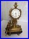 Ancienne-petite-pendule-bronze-dore-XIXeme-personnage-XVIII-01-cga