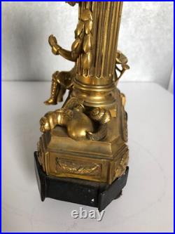 Ancienne petite pendule bronze doré XIXème personnage XVIII