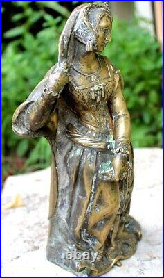 Ancienne statue en bronze de pendule