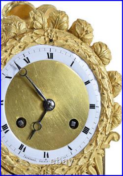 BIBLIOTHEQUE KINABLE. Kaminuhr Empire clock bronze horloge antique pendule uhren