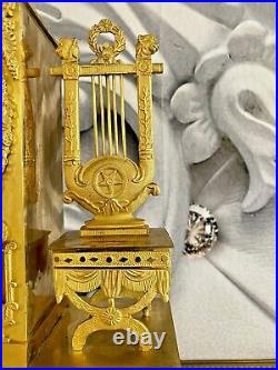 Belle pendule ancienne Empire et bronze doré ALLEGORIE MUSIQUE D'ébut 19éme