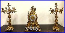Chandeliers Et Horloge. Style Louis Xv. Bronze. Epoque Napoleon Iii. La France