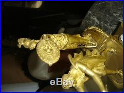 Exceptionnelle pendule char d'époque 1er empire en bronze doré au mercure