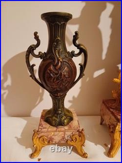 Garniture de cheminée Harmonie par Ruffony, signée Ruchot Régule & Marbre Garniture de cheminée Harmonie par Ruffony, signée Ruchot Régule & Marbre