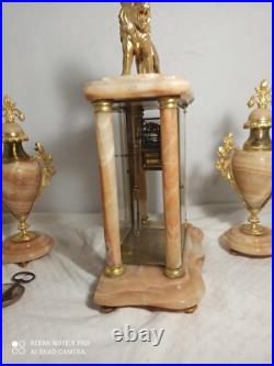 Garniture pendule cage et cassolettes onyx, bronze dore fonctionne sonne