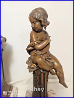 Garniture pendule et putti en pendant(Moreau) marbre et regule fonctionne sonne