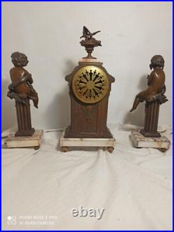 Garniture pendule et putti en pendant(Moreau) marbre et regule fonctionne sonne