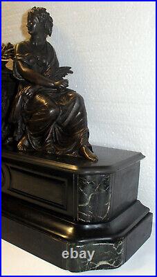 Grande pendule 19ème de femme en Bronze et marbre