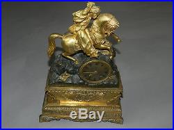Grande pendule Restauration Empire en bronze doré et patiné Bacchus début 19è