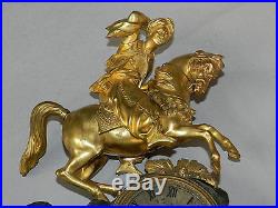 Grande pendule Restauration Empire en bronze doré et patiné Bacchus début 19è