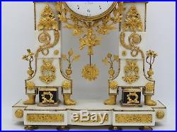 Horloge Pendule Portique d'époque Louis XVI en Bronze dorè et marbre -du 18ème