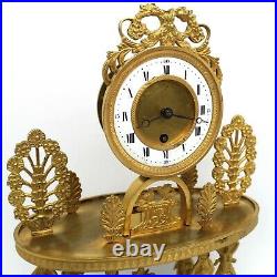Horloge Pendule Portique d'époque Restauration en Bronze doré -du 19ème siècle
