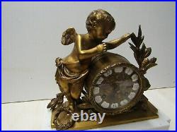 Horloge angelot bronze