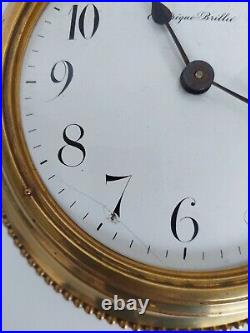 Horloge électrique Brilliè en laiton et bronze de style Louis XVI à pendre