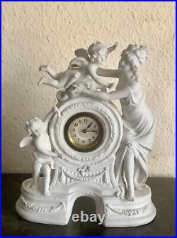 Horloge en biscuit blanc avec angelots