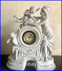 Horloge en biscuit blanc avec angelots