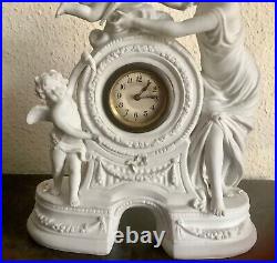 Horloge en biscuit blanc avec angelots