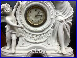 Horloge en biscuit blanc avec angelots