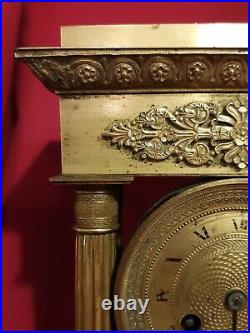 Horloge en bronze doré époque Empire XIX ème s