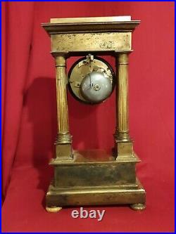 Horloge en bronze doré époque Empire XIX ème s