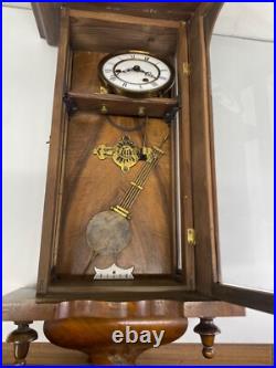 Horloge murale ancienne en bois avec ange dans son jus à restaurer très ancien