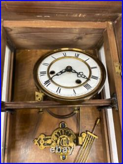 Horloge murale ancienne en bois avec ange dans son jus à restaurer très ancien