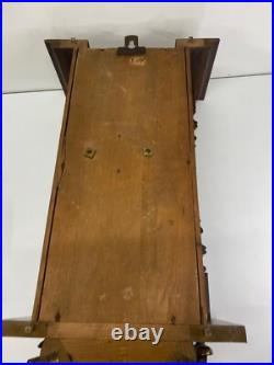 Horloge murale ancienne en bois avec ange dans son jus à restaurer très ancien