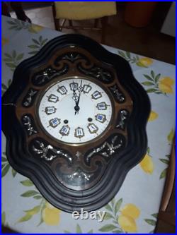 Horloge oeil de boeuf avec incrustations de nacre napoléon III fin 19eme siecle
