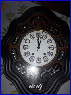 Horloge oeil de boeuf avec incrustations de nacre napoléon III fin 19eme siecle