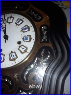 Horloge oeil de boeuf avec incrustations de nacre napoléon III fin 19eme siecle