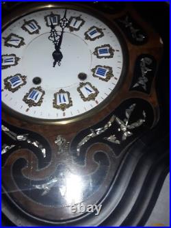 Horloge oeil de boeuf avec incrustations de nacre napoléon III fin 19eme siecle
