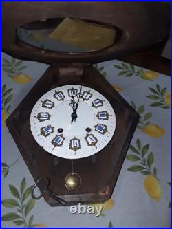 Horloge oeil de boeuf avec incrustations de nacre napoléon III fin 19eme siecle