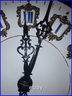 Horloge oeil de boeuf avec incrustations de nacre napoléon III fin 19eme siecle