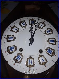 Horloge oeil de boeuf avec incrustations de nacre napoléon III fin 19eme siecle