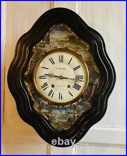 Horloge oil de bouf peint, avec son mouvement de Morez, époque Napoléon III