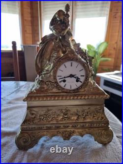 Horloge, pendule bronze doré, début XIXe