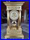 Horloge-pendule-bronze-dore-empire-balancier-au-couteau-01-ur