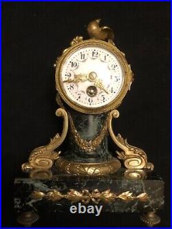 Horloge pendule bronze louis XVI decor d'oiseaux