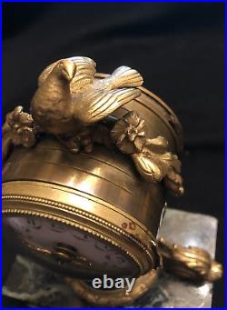 Horloge pendule bronze louis XVI decor d'oiseaux