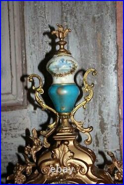 Horloge pendule cartel du XIX ème en bronze et porcelaine style Louis XVI