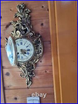 Horloge, pendule d'applique en bronze du XIXe siècle
